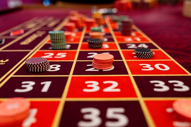 Mobile app interface showing live casino table selection and game lobby